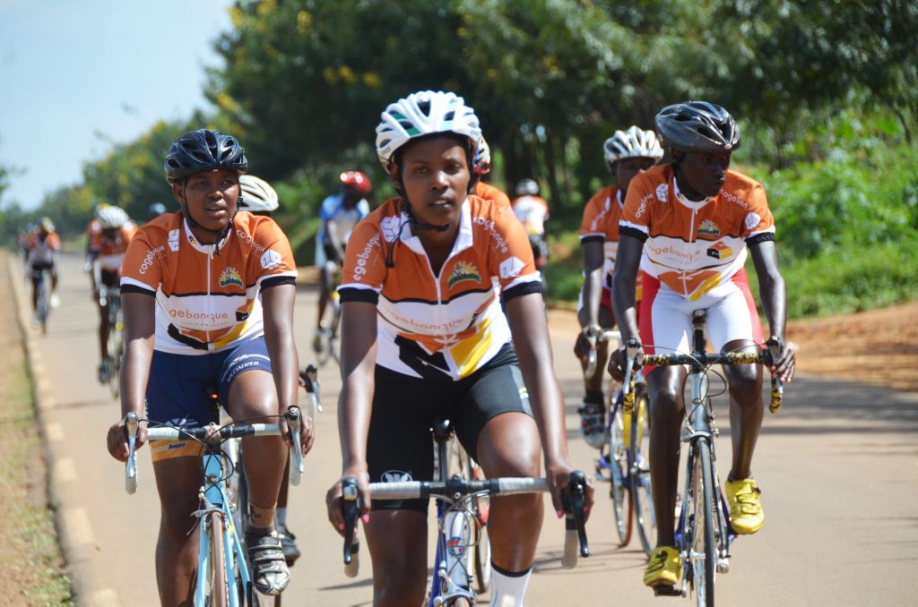 Race to remember gathers three distinctive categories of riders. Female riders, junior riders and senior riders. this photo highlights two girls who are emerging to join Jean d'Arc who has been experiencing cycling over Africa.