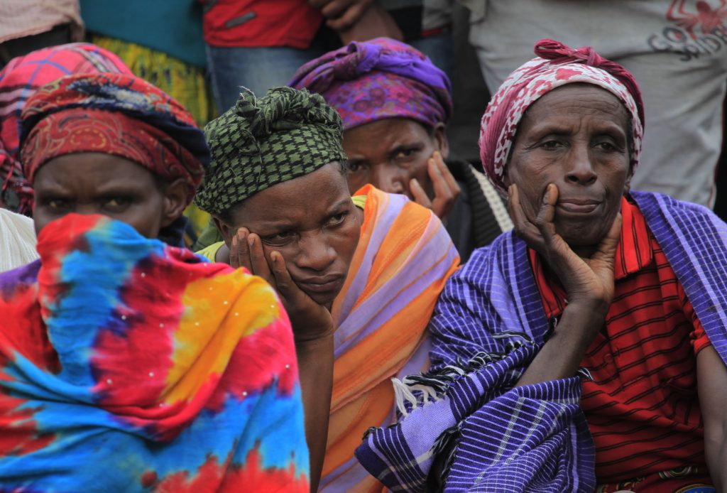 Mourners listen to the moving testimony delivered by Simon Mutangana.